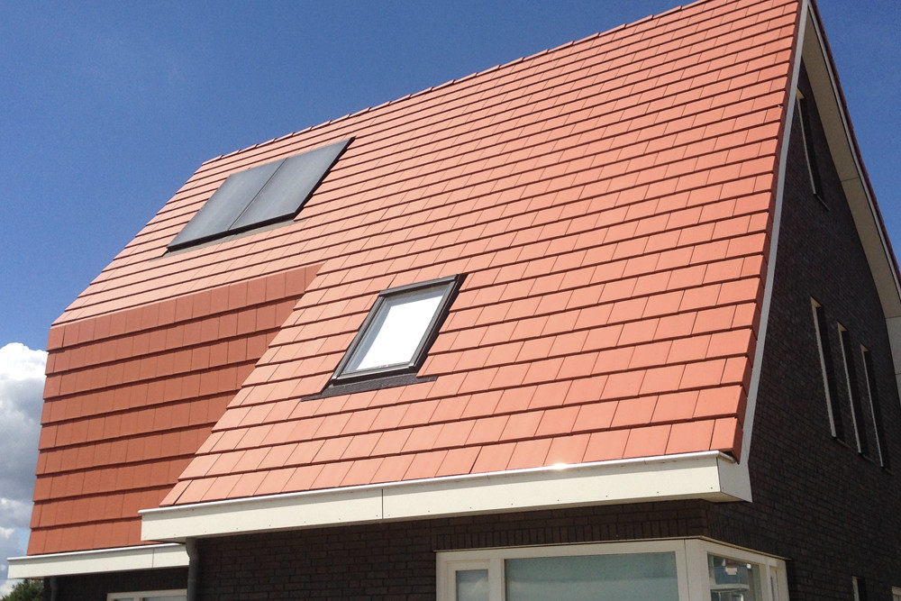 Planum Concrete roof tile with mansard feature